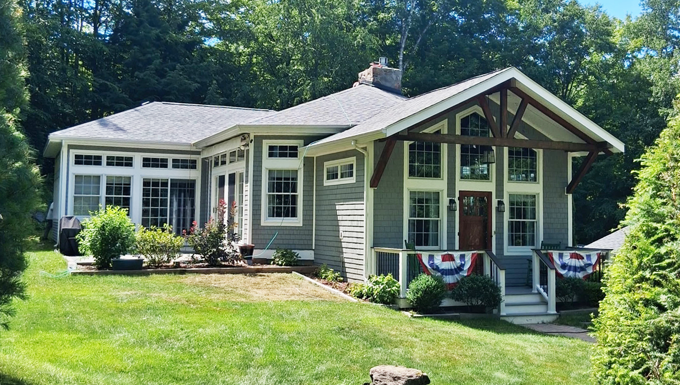 Craftsman style home with new construction roofline