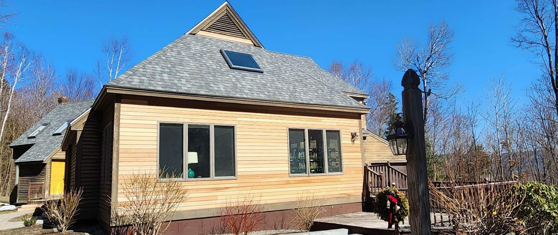 Cedar shingle siding and roofing project in Danbury NH