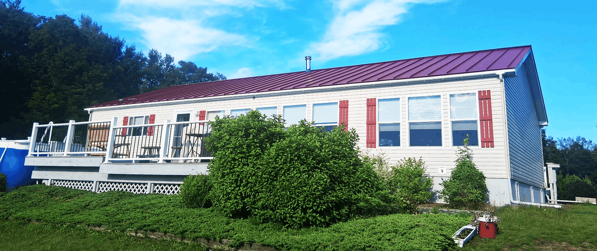 Red standing seam metal roof installed by LaVorgna's Construction